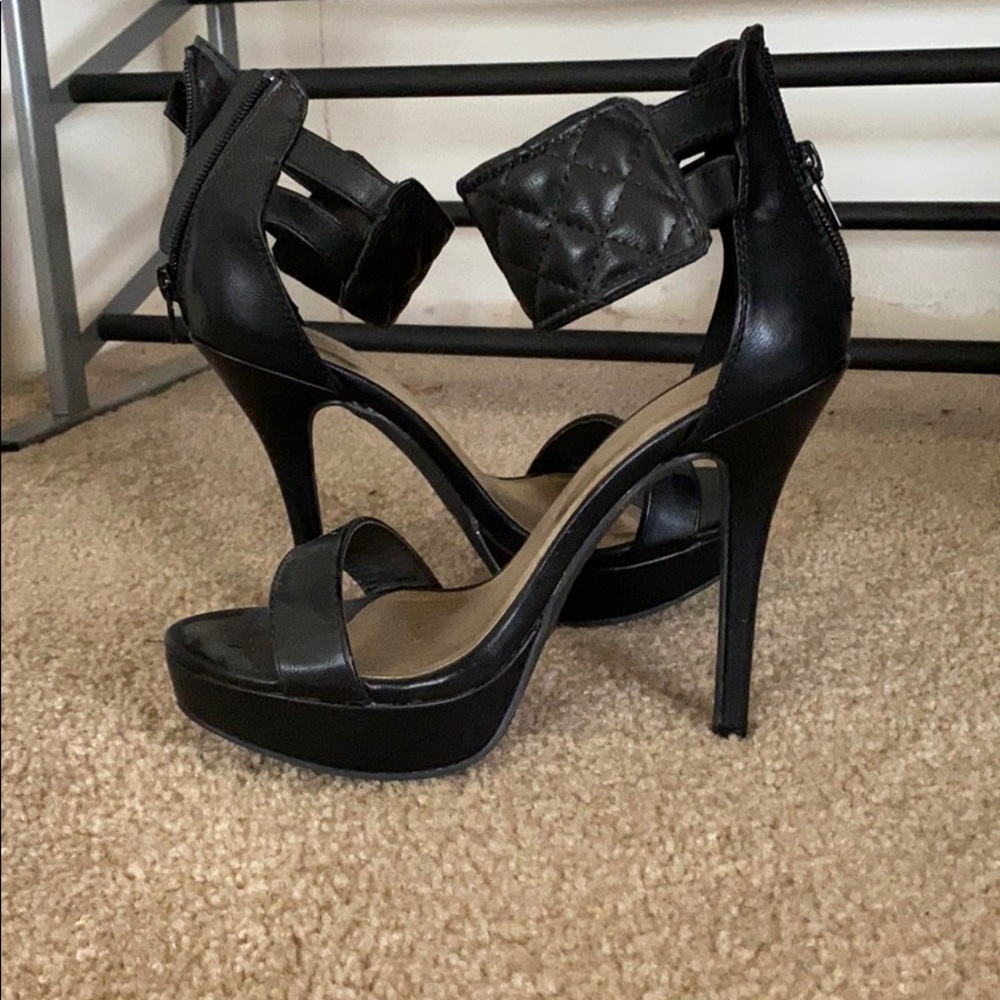 Black open toed high heel with ankle cuff